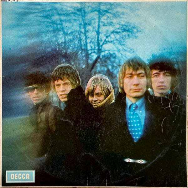between the buttons (uk-1967)